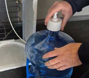 Changing the water bottle of your bottom loaded cooler